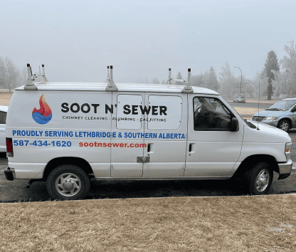 Soot N' Sewer service van for chimney cleaning and plumbing in Alberta.